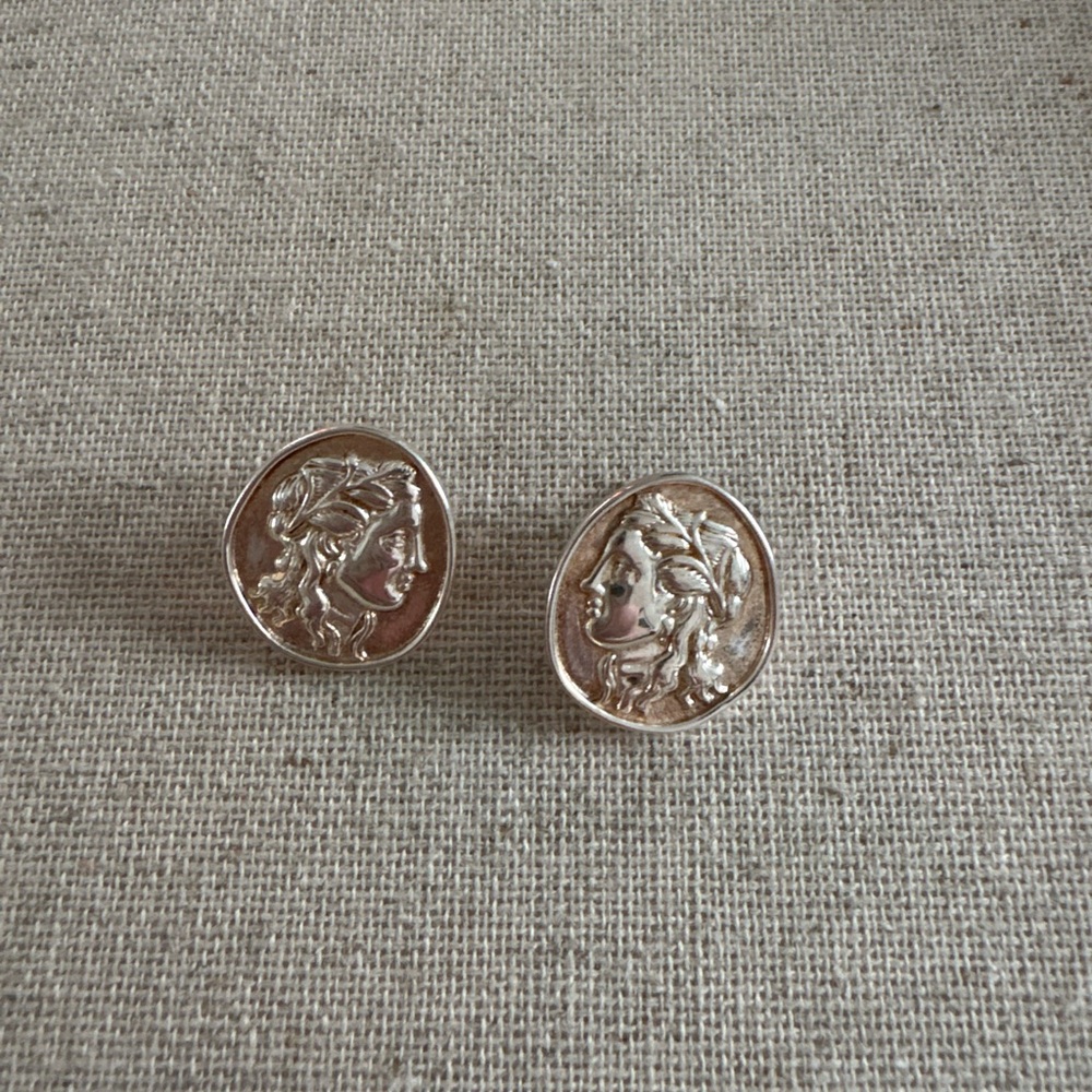 Silver earrings of Athena